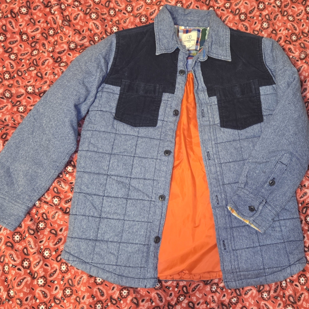Blue Quilted Jacket with Black Accents